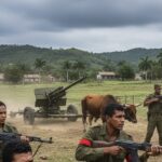 cuba si a luat drone din rusia si iran invazia americana pare a fi iminenta antrenamentele populatiei cu armament sovietic invechit inclusiv tunuri antiaeriene tractate de boi 6a0a06d8ca0c5